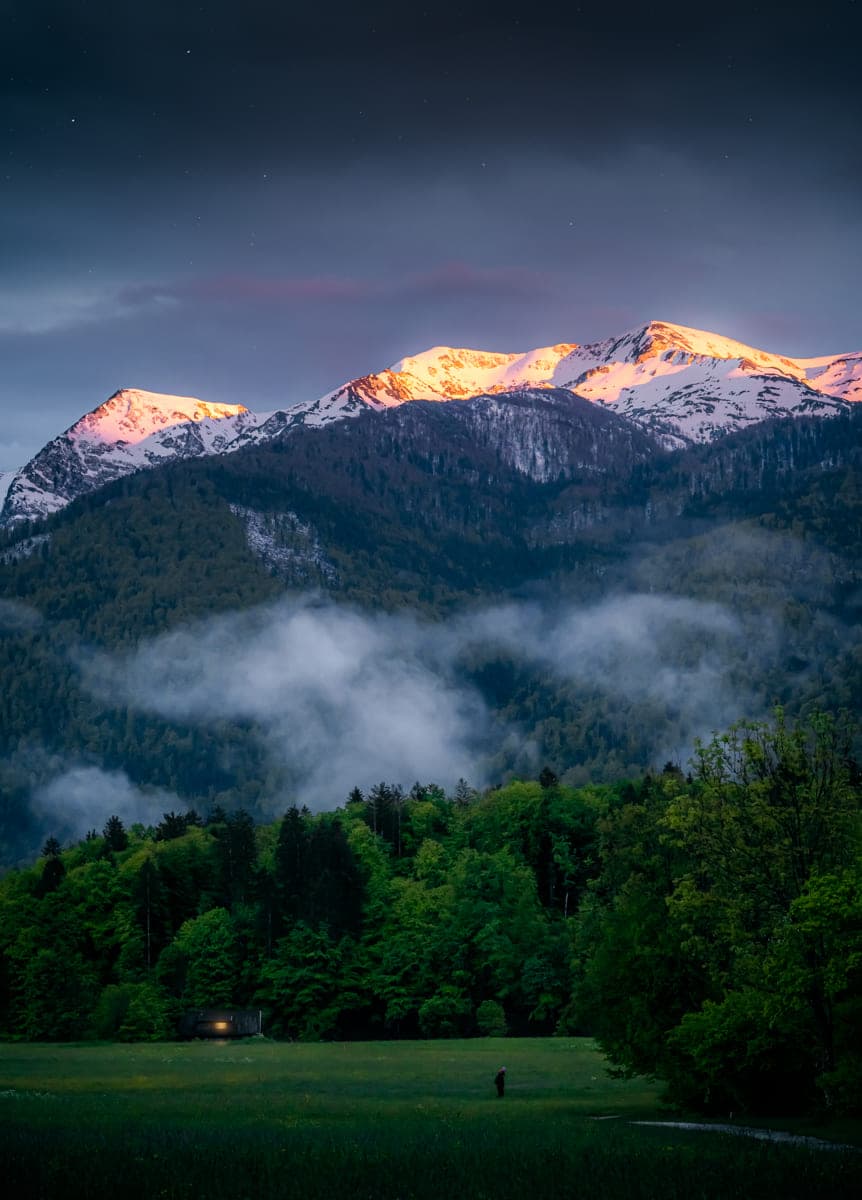 Photo composite of sunlight touching the mountains